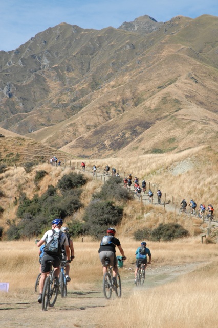 Riders exiting Aid Station 2 heading up into the Motatapu Valley. 